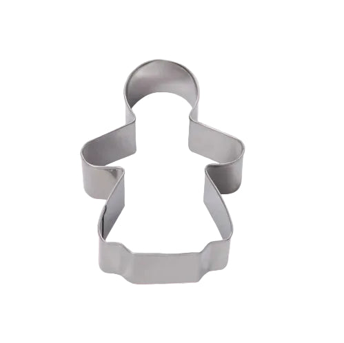 A metal cookie cutter in the shape of a smiling gingerbread girl.
