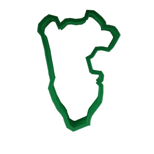 A green plastic cookie cutter in the shape of a map of Peru.